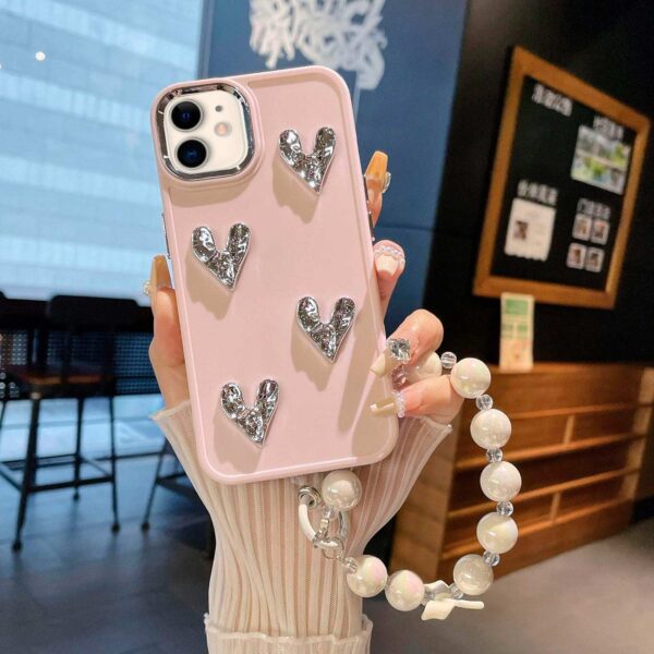 iPhone 11 - Protector con pulsera de perlas, diseño de corazones 3D brillantes, serie dulce latido